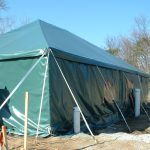 30×40 Celebration tent used as a permanent housing facility