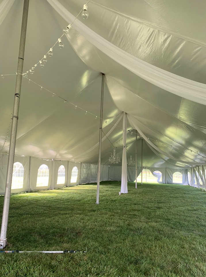 Interior shot of an Armbruster EuroTent. The Armbruster EuroTent makes a beautiful, elegant event space for an outdoor wedding.