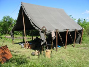 Armbruster World War II Large Wall Tent. Our tents are secure and can withstand rainstorms.