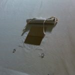 Custom Outfitter Canvas Tent for Store Display in Montana - Stove Pipe Opening Detail